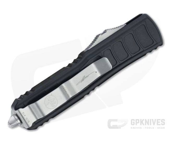 Microtech UTX-85 II D/E Stepside Signature Stonewashed Full Serrated M390 Double Edge OTF Automatic Knife 232II-12S 4 Microtech UTX-85 II D/E Stepside Signature Stonewashed Full Serrated M390 Double Edge OTF Automatic Knife 232II-12S - Image 2