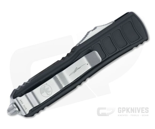 Microtech UTX-85 II D/E Stepside Signature Satin Full Serrated M390 Double Edge OTF Automatic Knife 232II-6S 4 Microtech UTX-85 II D/E Stepside Signature Satin Full Serrated M390 Double Edge OTF Automatic Knife 232II-6S - Image 2